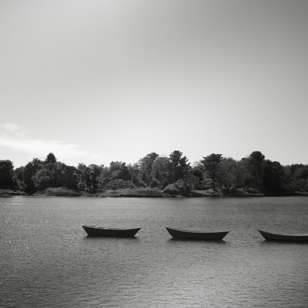 Black and white boats lake three
