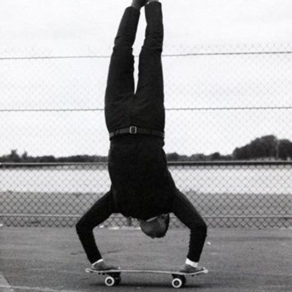 Poirier skateboarding handstand